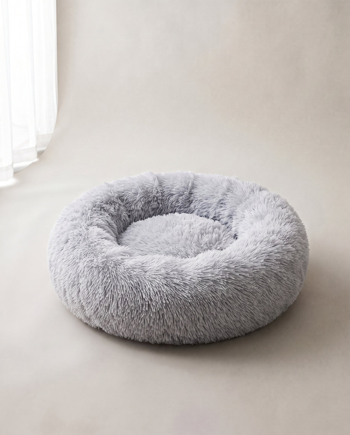 kuschelrund Donut-Bett in Hellgrau